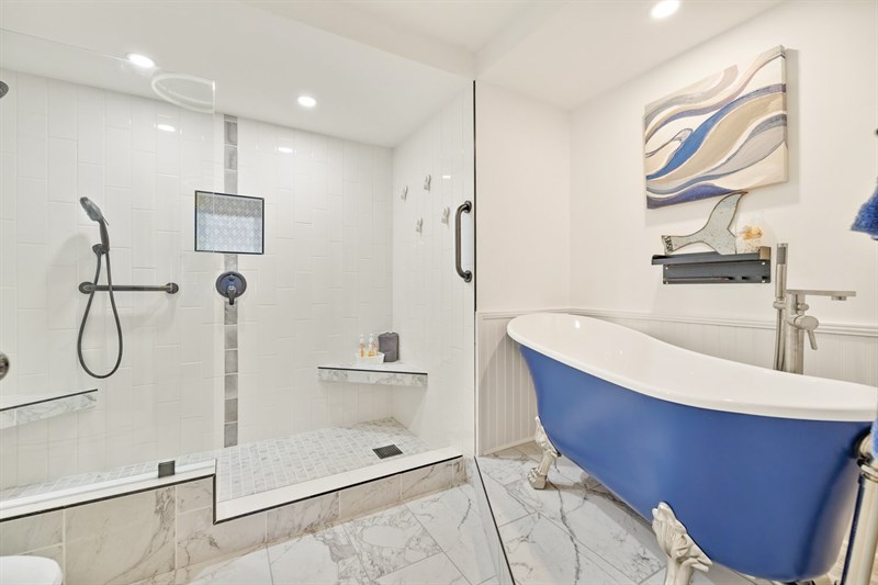 Spa like Master Bath with large walk-in shower and beautiful claw foot tub